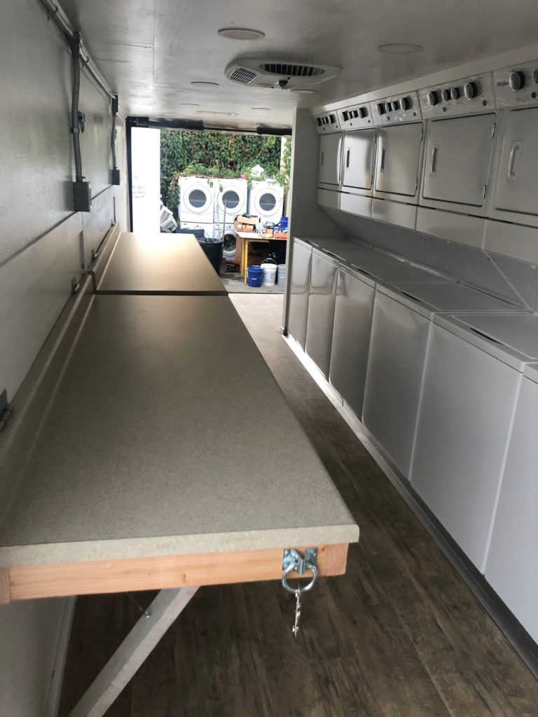 Interior of our Mobile Laundry Trailer Rental - Find information on renting a portable laundry trailer.