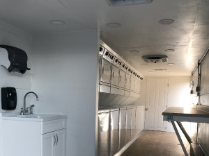 Portable Laundry Trailer with 8 Washers Dryer Sets Sing Folding Table