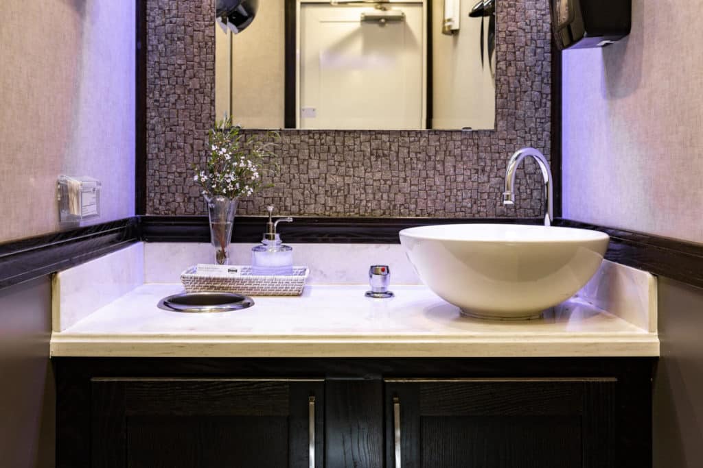 Wedding & Corporate Event VIP Restroom Trailer Rental, luxury porta potty interior view from Major Event Trailers in Ventura, CA.