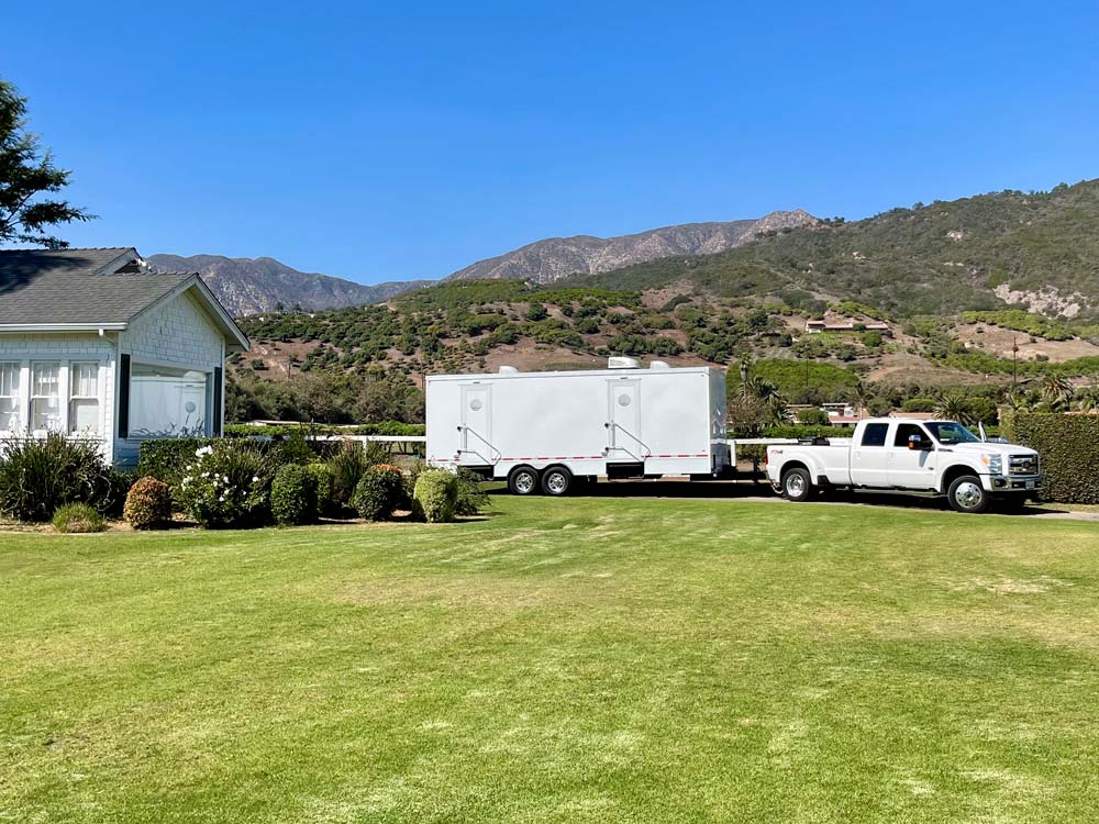 Luxury restroom trailer delivery at Santa Barbara Polo & Racquet Club event by Major Event Trailers