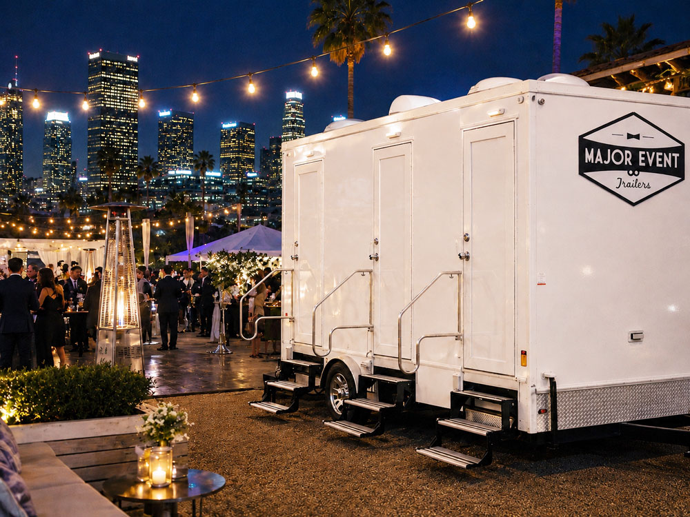 Luxury porta potty rental at an upscale event at night in downtown Los Angeles by Major Event Trailers.